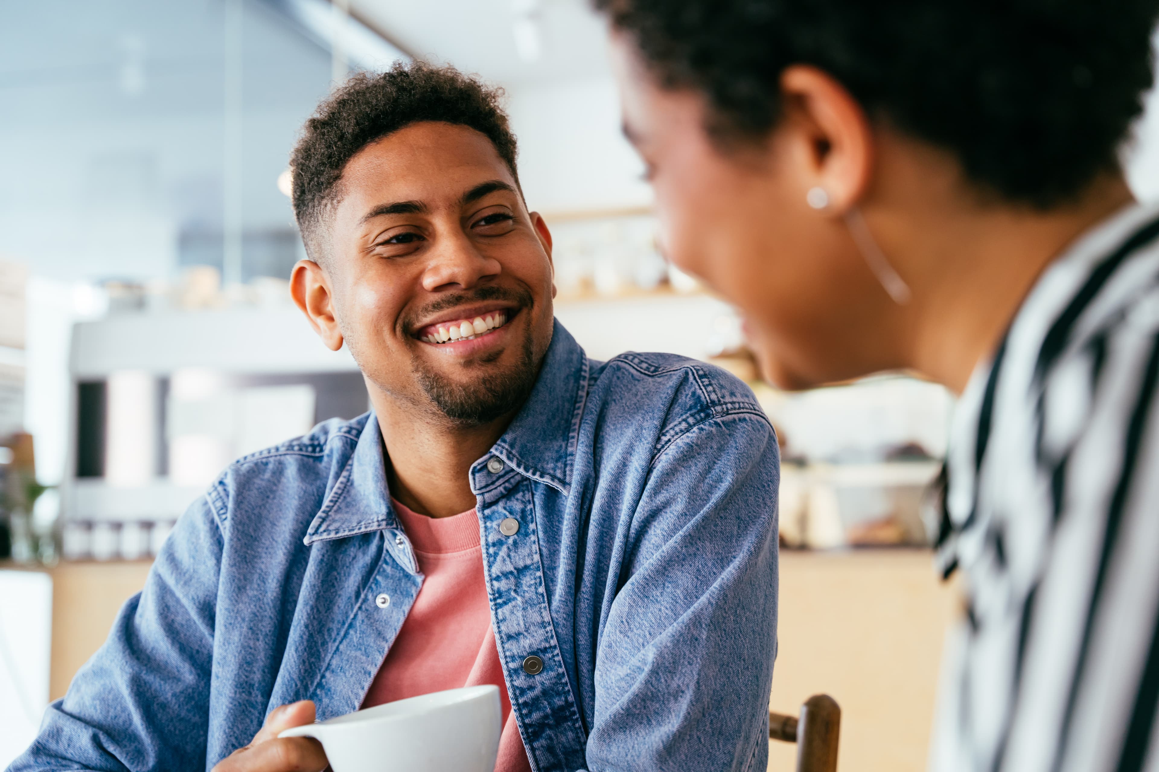 Two people in warm conversation