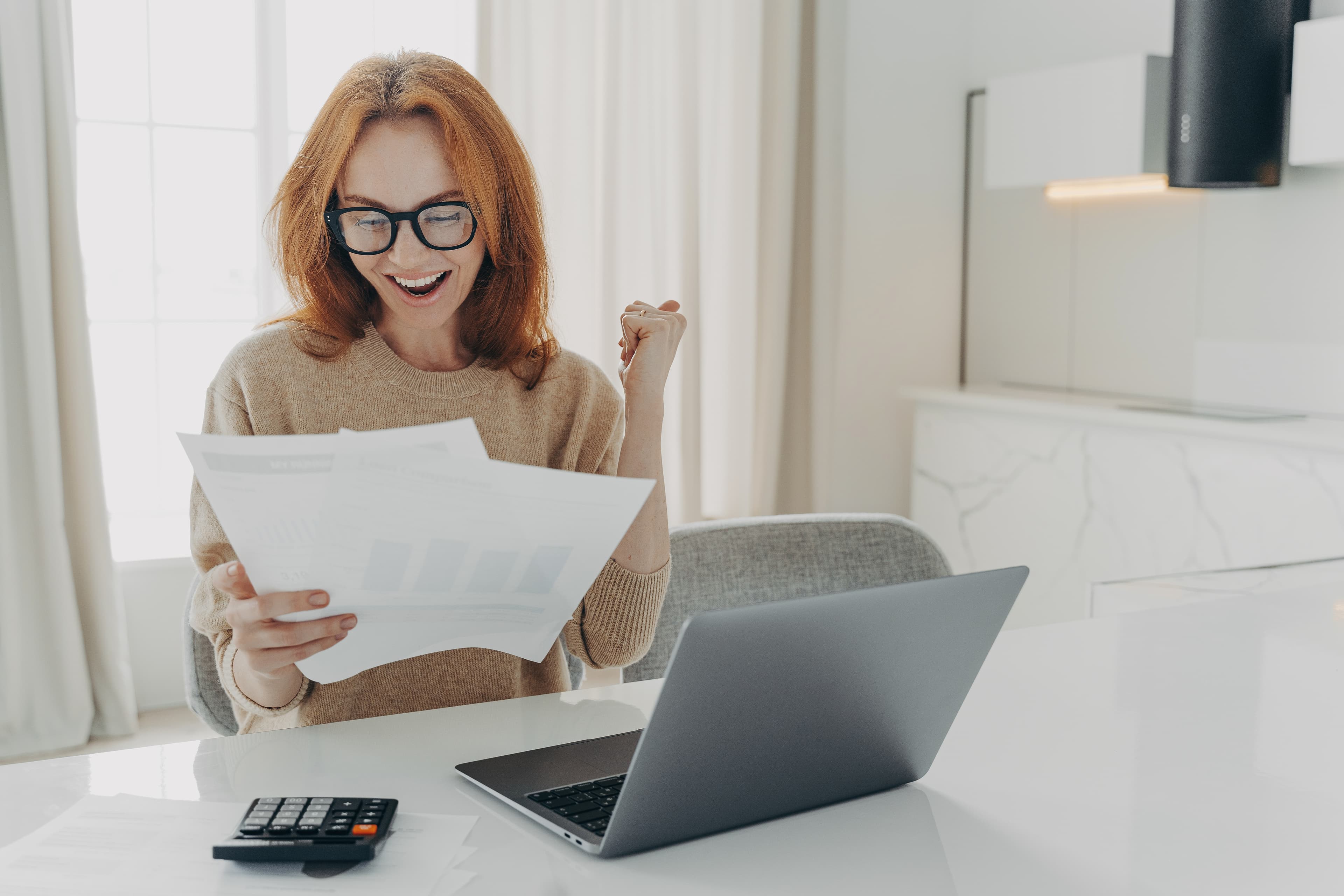 Quiet financial decision moment in warm natural light